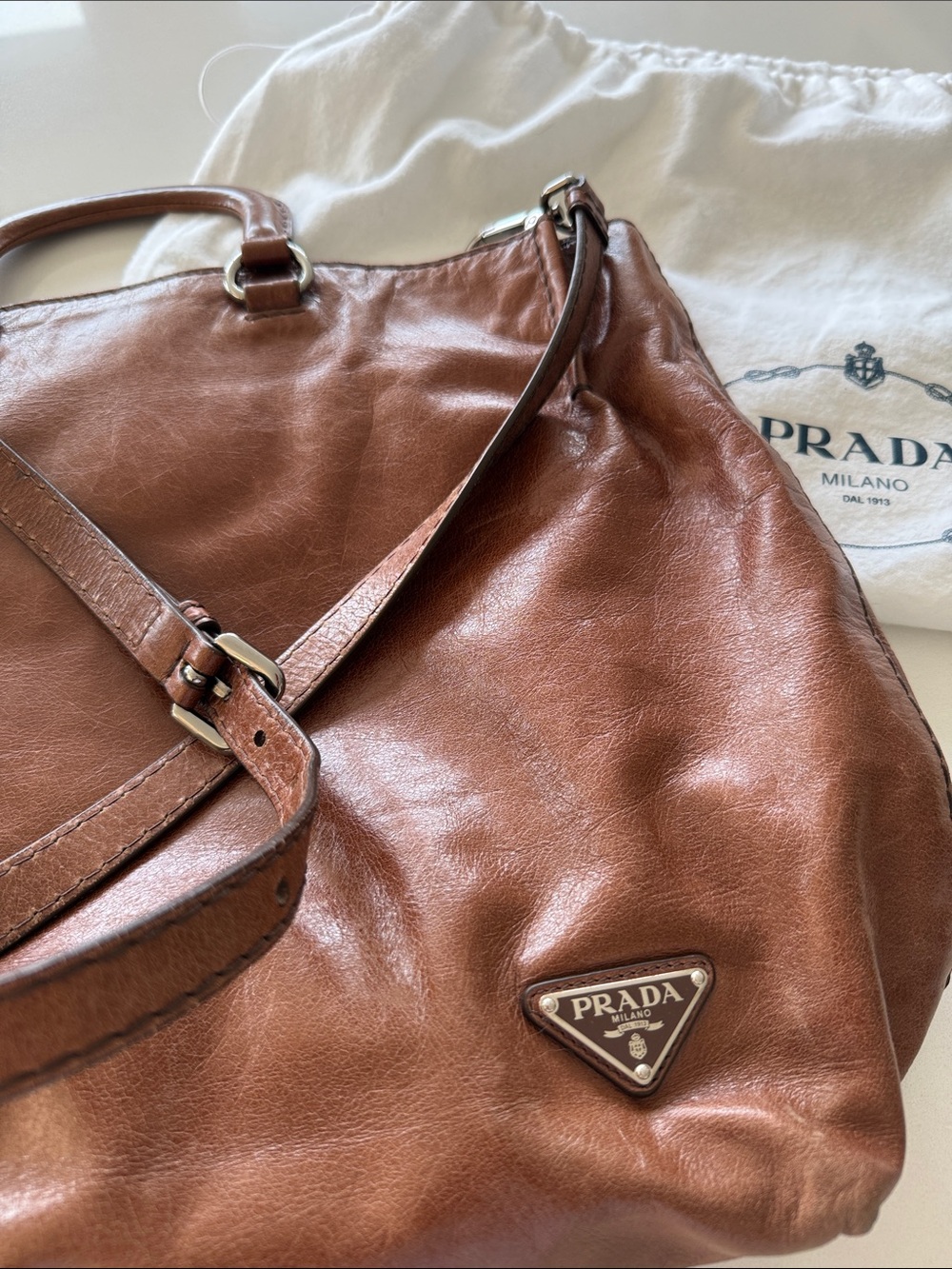 Prada VINTAGE Cognac Brown Leather Shoulder Bag with Triangular Logo. Early 1990